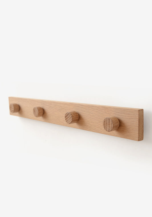 wall mounted magnetic modern notice rail made from oak