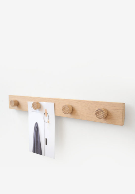 wall mounted magnetic modern notice rail made from oak